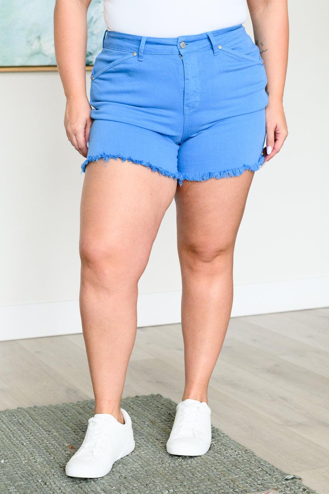 Judy Blue | Celeste Mid Rise Shield Pocket Cutoff Shorts in Sky Blue - becauseofadi