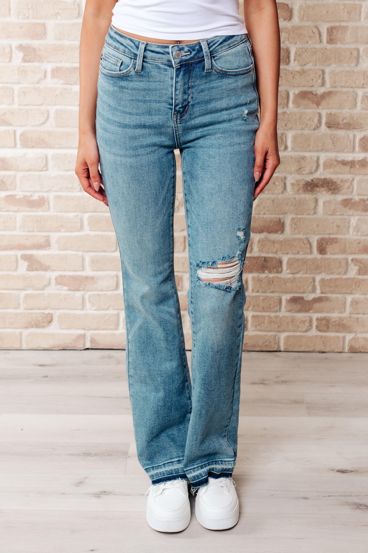 Judy Blue | Isla Mid Rise Distressed Released Hem Bootcut Jeans - becauseofadi