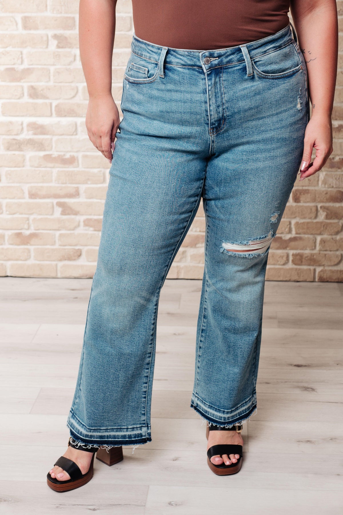 Judy Blue | Isla Mid Rise Distressed Released Hem Bootcut Jeans - becauseofadi