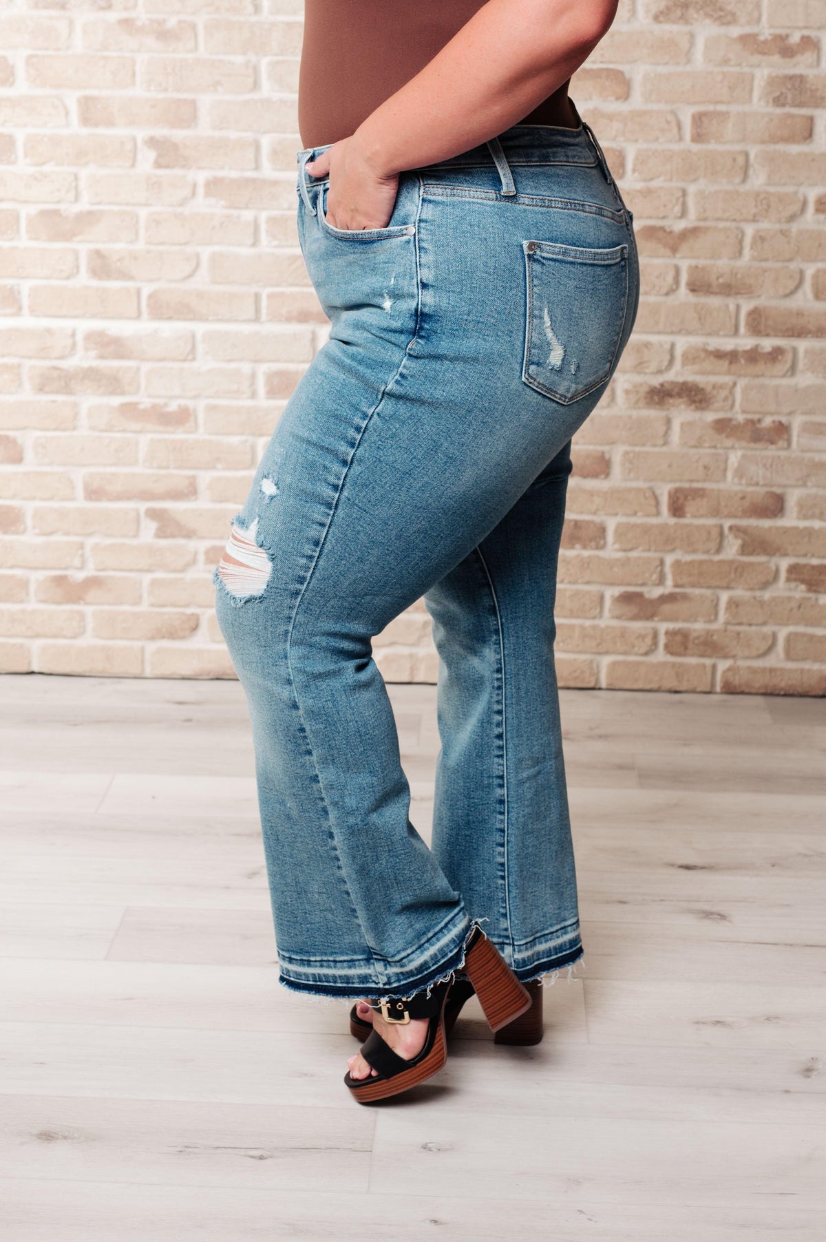 Judy Blue | Isla Mid Rise Distressed Released Hem Bootcut Jeans - becauseofadi